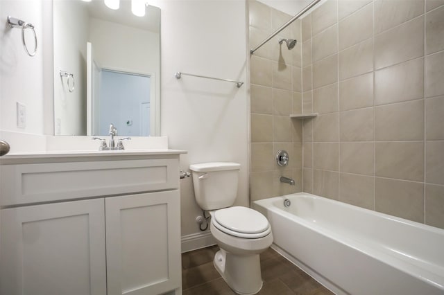4030 Colony Ln, Missouri City, TX 77459 - full bath with toilet, vanity, shower / tub combination, wood finished floors, and baseboards