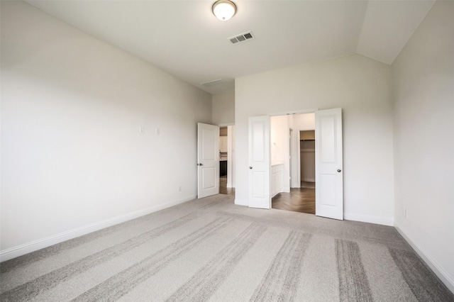 4030 Colony Ln, Missouri City, TX 77459 - unfurnished bedroom with carpet, baseboards, and lofted ceiling