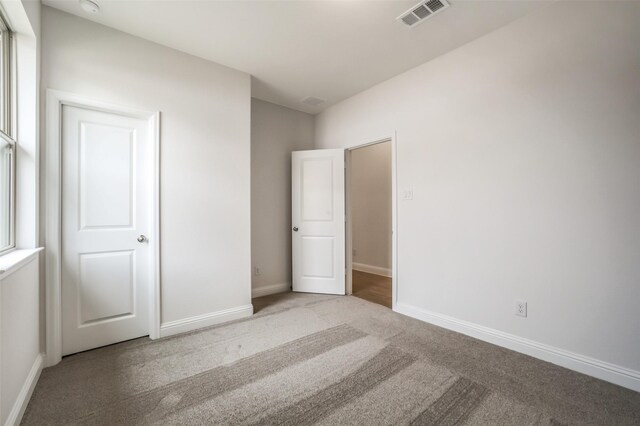 4030 Colony Ln, Missouri City, TX 77459 - unfurnished bedroom featuring carpet floors and baseboards