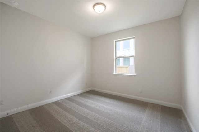 4030 Colony Ln, Missouri City, TX 77459 - carpeted spare room featuring baseboards and a smoke detector