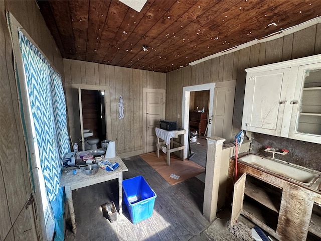 miscellaneous room featuring wood ceiling and wood-type flooring