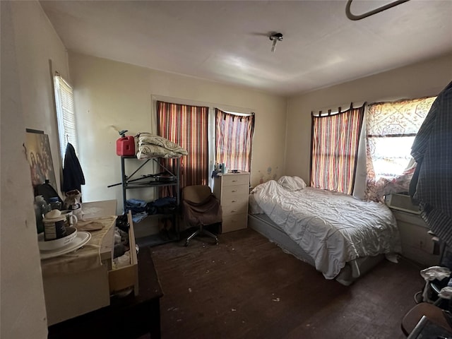 bedroom featuring dark hardwood / wood-style floors