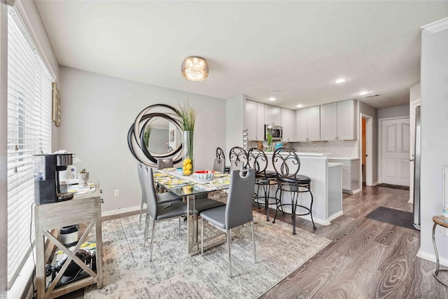 dining area featuring light hardwood / wood-style floors