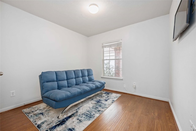 sitting room featuring hardwood / wood-style flooring