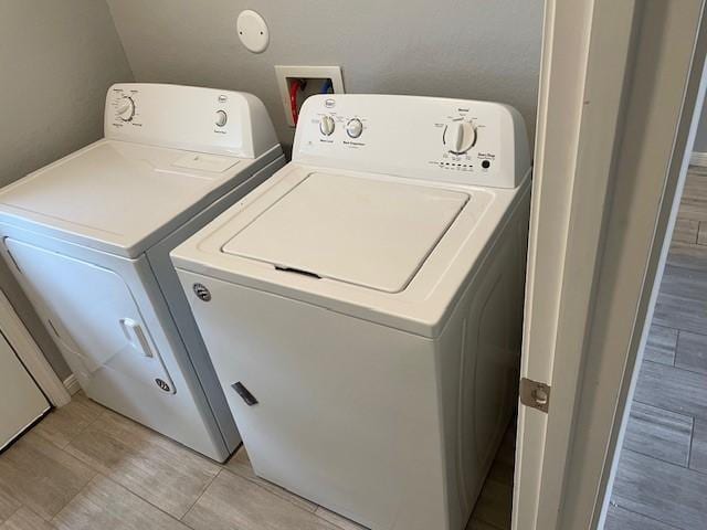 laundry area featuring independent washer and dryer