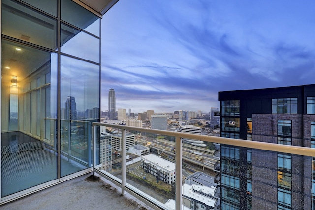 view of balcony at dusk