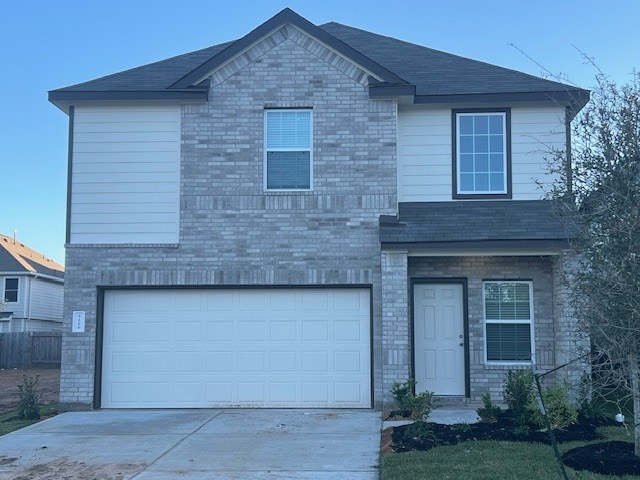 front facade with a garage