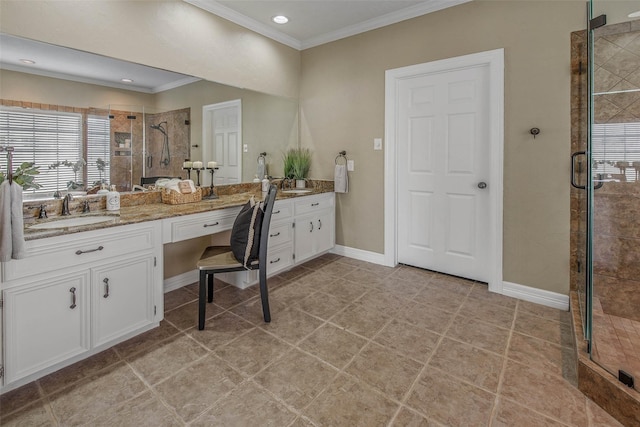 bathroom featuring vanity, crown molding, and a shower with shower door