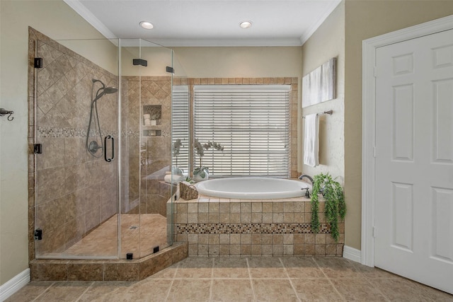 bathroom with separate shower and tub and ornamental molding