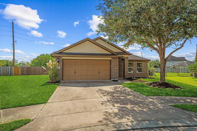 ranch-style home with a garage and a front lawn