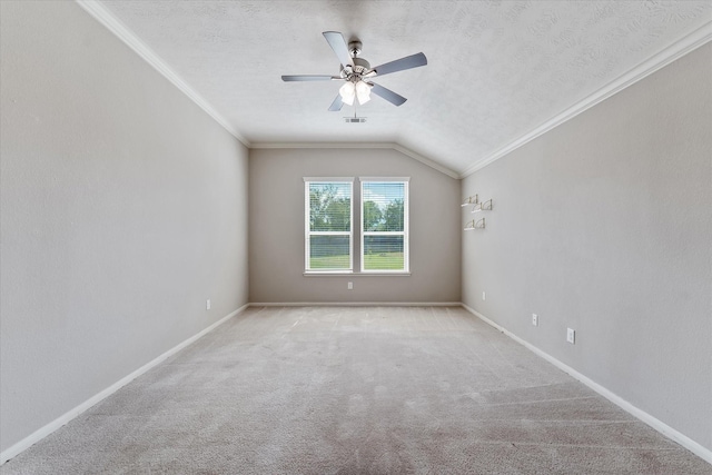 additional living space featuring ceiling fan, light colored carpet, lofted ceiling, and a textured ceiling