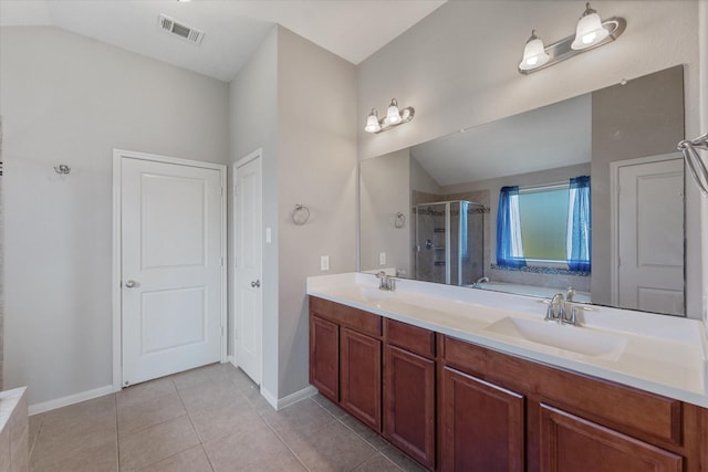 bathroom featuring separate shower and tub, tile patterned floors, vanity, and vaulted ceiling