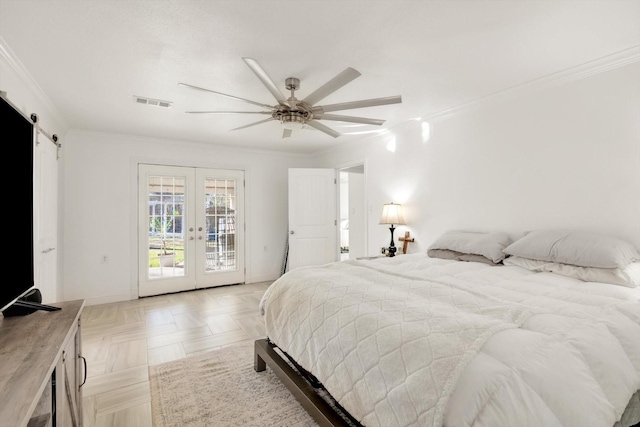 bedroom featuring ceiling fan, french doors, a barn door, access to outside, and ornamental molding