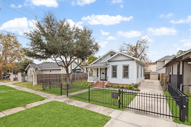 bungalow-style house with a front yard