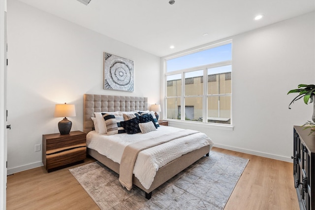 bedroom featuring light hardwood / wood-style floors