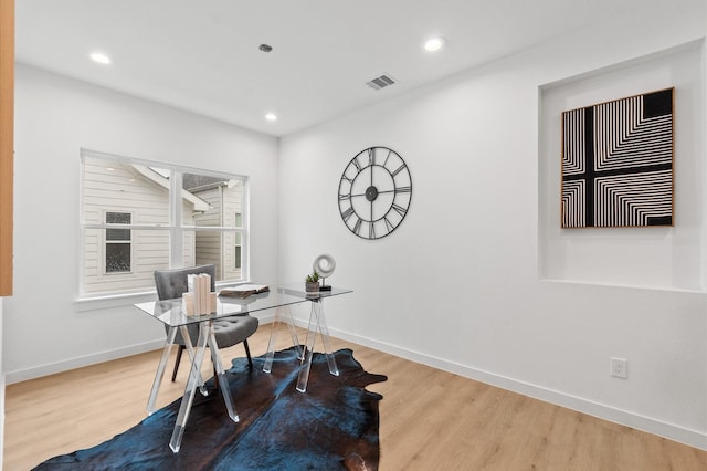 office space featuring hardwood / wood-style floors