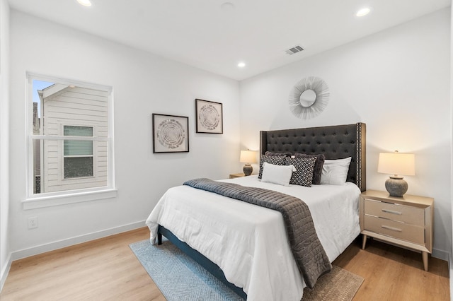 bedroom featuring light hardwood / wood-style flooring