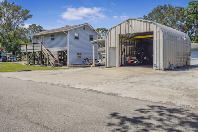 view of outdoor structure with a garage