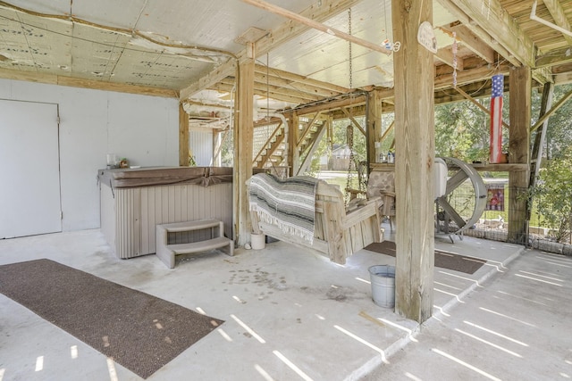 view of patio / terrace with a hot tub