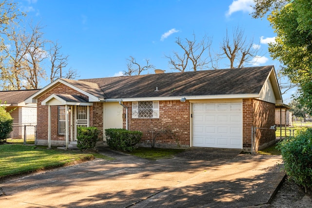 single story home with a front lawn and a garage