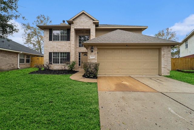 front of property featuring a garage and a front yard