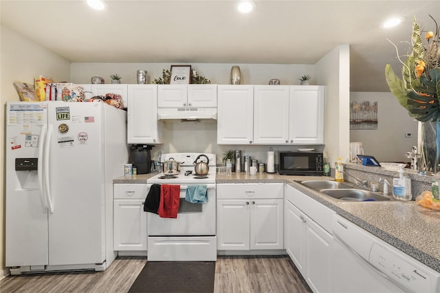 kitchen with white cabinetry, light wood-type flooring, white appliances, and sink