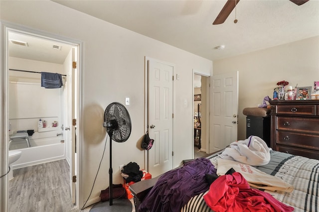 bedroom featuring ceiling fan and light hardwood / wood-style flooring