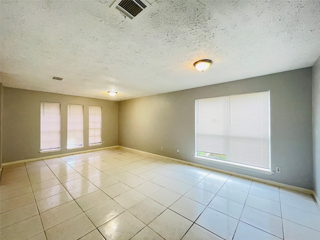 view of tiled empty room