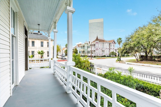 balcony featuring a porch