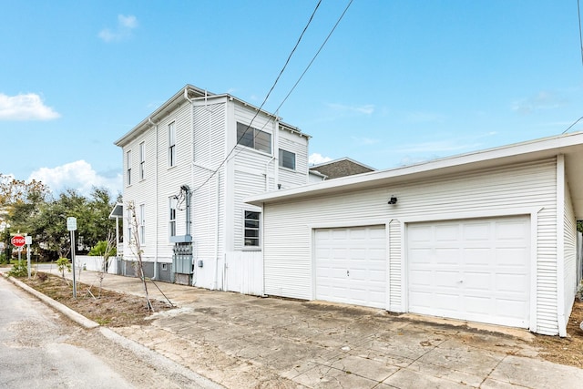 exterior space featuring a garage