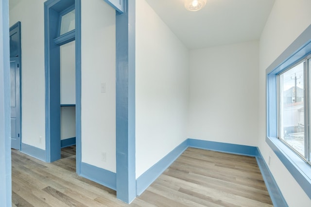 unfurnished room with light hardwood / wood-style flooring