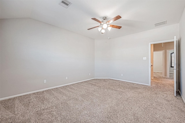 unfurnished room featuring carpet floors, ceiling fan, and lofted ceiling