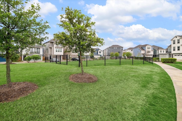 surrounding community with a yard