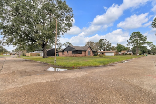 view of front of home with a front yard