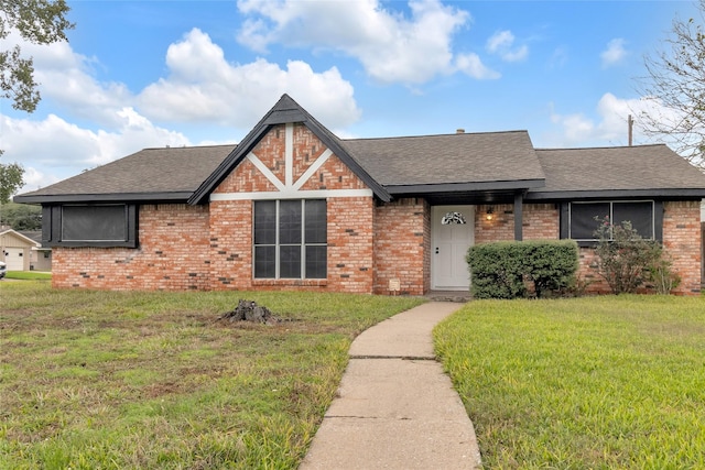 view of front of home with a front yard