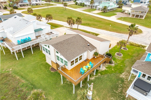 birds eye view of property with a residential view