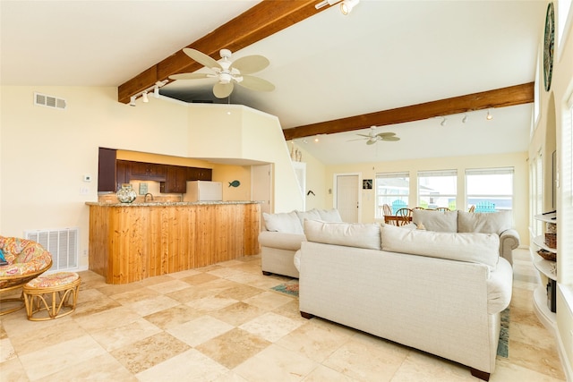 living area with lofted ceiling with beams, visible vents, and a ceiling fan