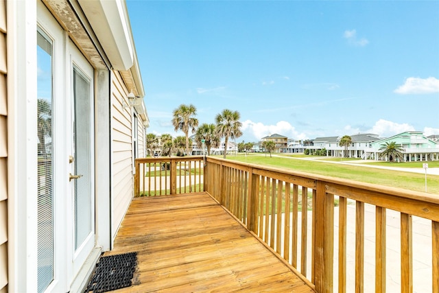 wooden deck featuring a residential view