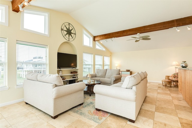 living room with light tile patterned flooring, beamed ceiling, baseboards, and ceiling fan