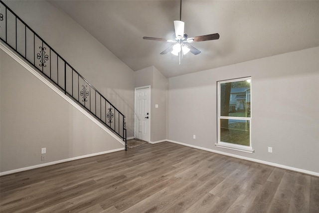 unfurnished living room featuring ceiling fan and light hardwood / wood-style floors