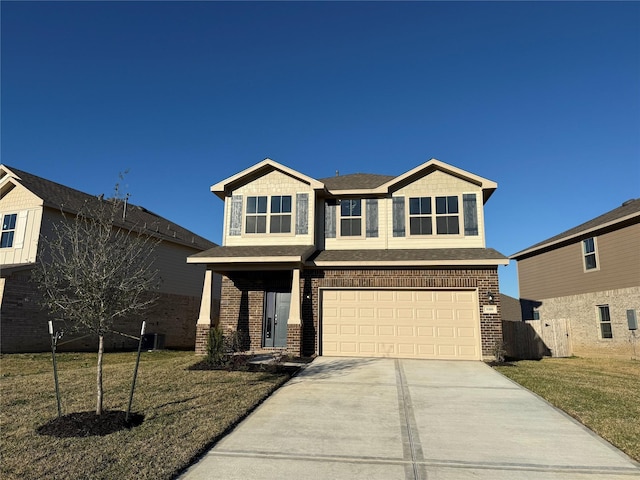 craftsman inspired home featuring a front lawn and a garage