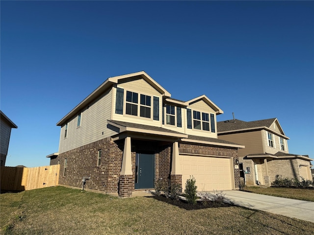 craftsman house featuring a garage and a front lawn