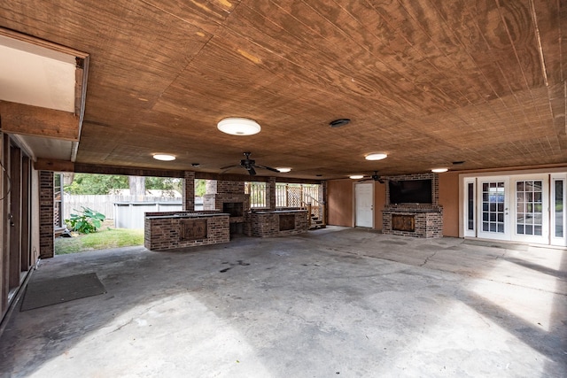 view of patio / terrace featuring area for grilling, ceiling fan, and french doors