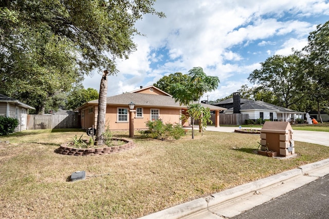 view of front of home with a front lawn