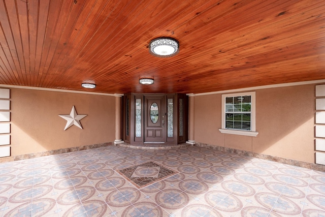 view of exterior entry with covered porch