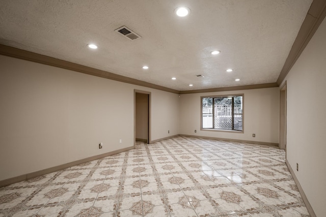 unfurnished room featuring a textured ceiling and crown molding