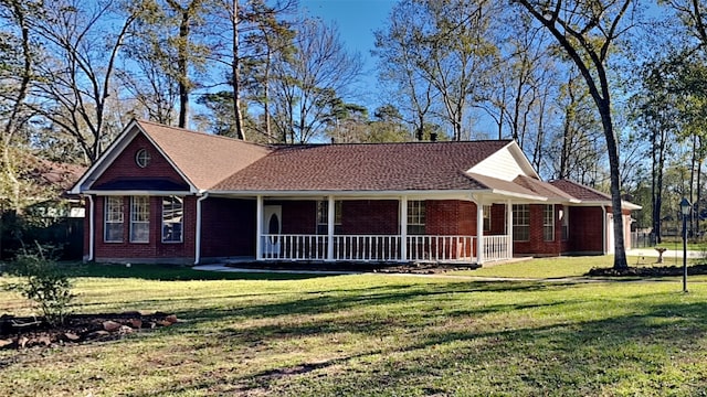 view of front of property with a front yard and a porch