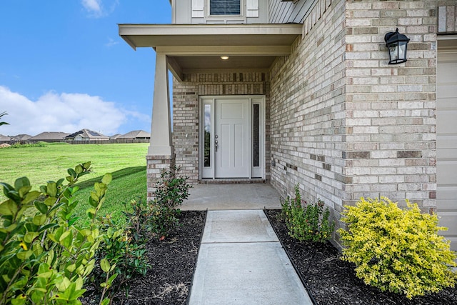 5307 W Bayou Maison Cir, Dickinson, TX 77539 - entrance to property featuring a lawn and brick siding