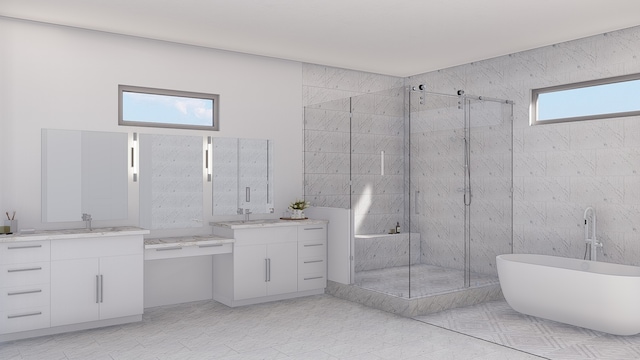 bathroom featuring shower with separate bathtub and vanity