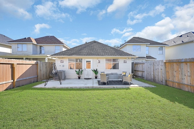 back of house featuring a yard, an outdoor living space, a patio area, and central air condition unit